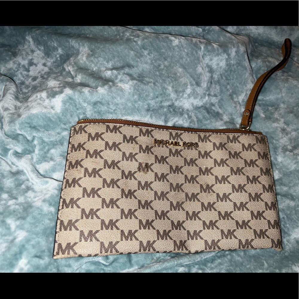 Medium logo wristlet. Tan color